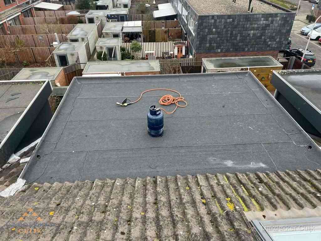 Dakreparatie plat dak met bitumen in Cuijk